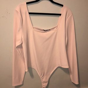 Baby pink ribbed body suit